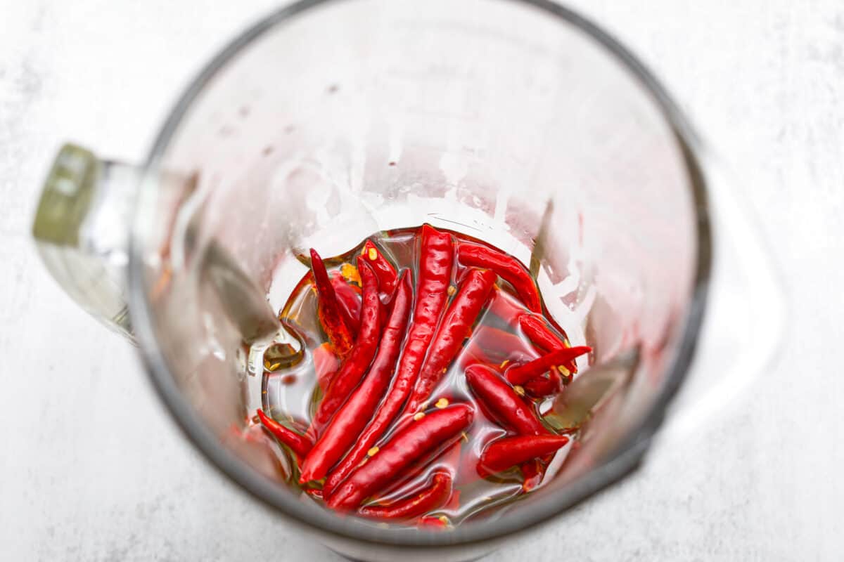 If hot sauce is something you use a lot in your kitchen, you have to try this homemade version! Tweak it to your liking then use it to upgrade all of your favorite dishes! Rehydrating dried peppers.