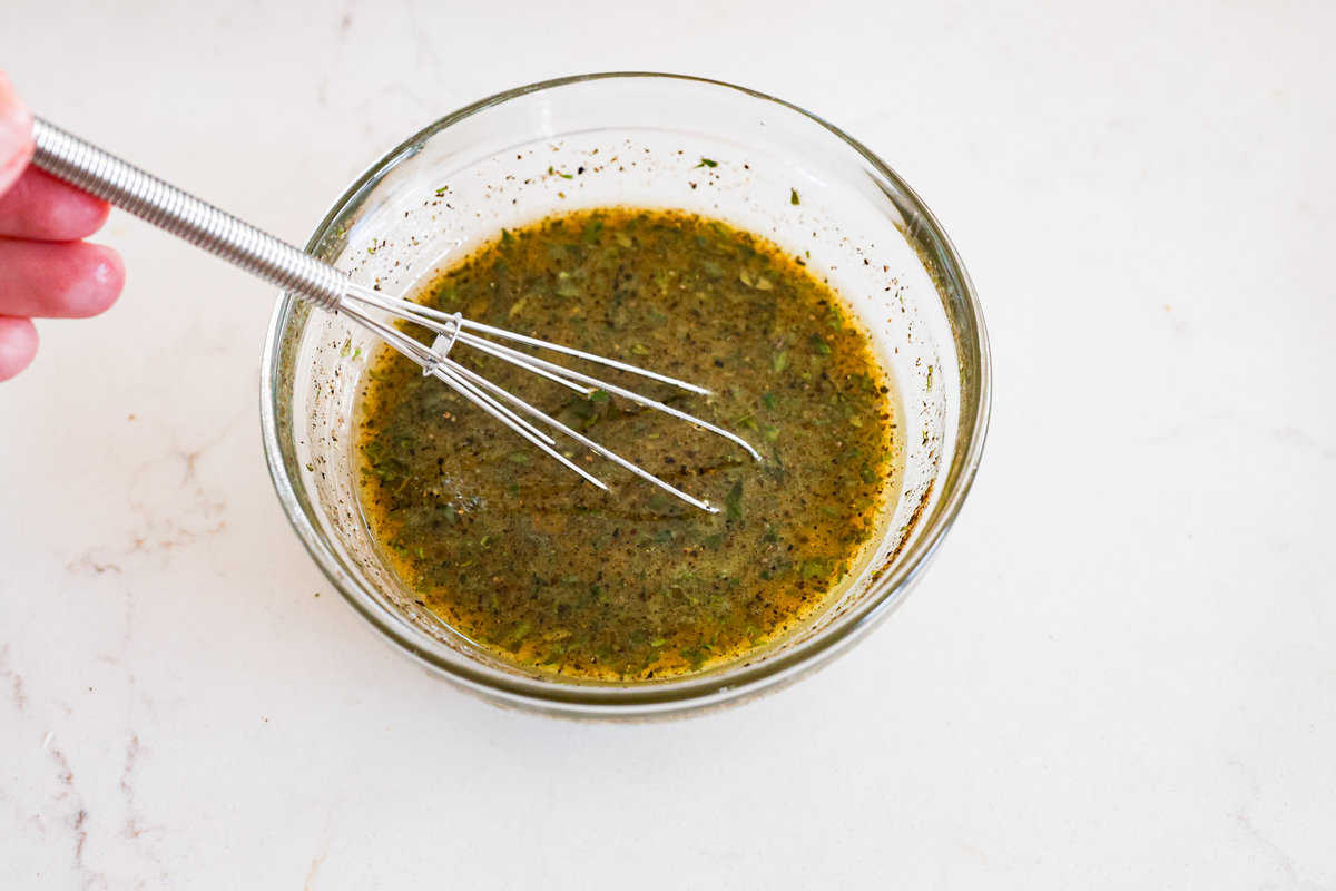 Craving the sweet, tangy flavor of the Cheesecake Factory's tamarind cashew dipping sauce? Look no further! This copycat recipe captures all the delicious flavors you love in a simple, homemade version that's ready in minutes. Whisking the tamarind cashew dipping sauce to ensure a smooth consistency.