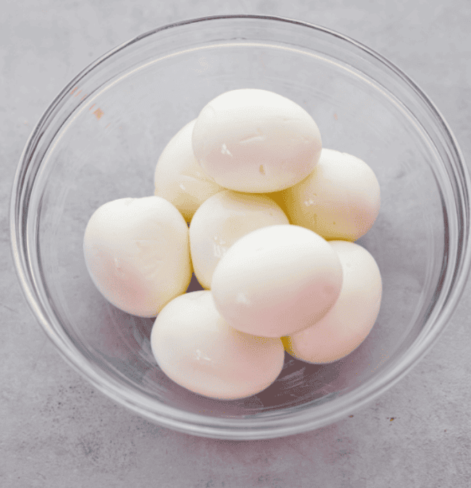 This egg salad has been a reader favorite for years because itโs creamy, simple, and lets the eggs shine. Itโs made with just a few ingredients, but the flavor is absolutely amazing and you can make it in just 25 minutes! A glass bowl with boiled eggs