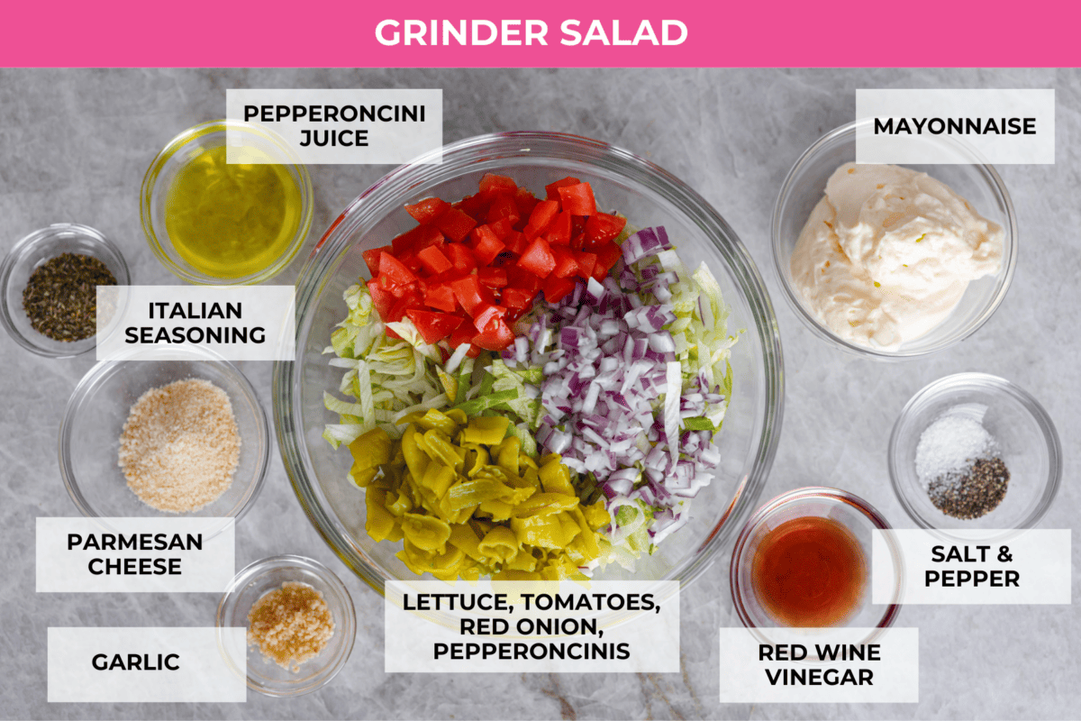 The classic grinder sandwich made into sliders to share! You've got Hawaiian rolls topped with layers of pepperoni, salami, turkey, provolone, and creamy grinder salad. And to top things off- each roll is brushed with a buttery parmesan glaze and baked to golden brown perfection. All of the ingredients for the grinder salad and dressing separated into glass bowls.