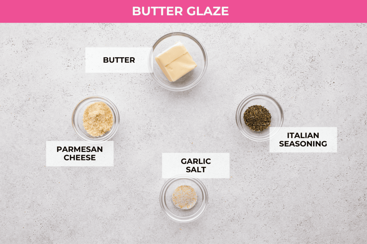 The classic grinder sandwich made into sliders to share! You've got Hawaiian rolls topped with layers of pepperoni, salami, turkey, provolone, and creamy grinder salad. And to top things off- each roll is brushed with a buttery parmesan glaze and baked to golden brown perfection. The butter glaze ingredients- butter, parmesan cheese, and Italian seasoning.