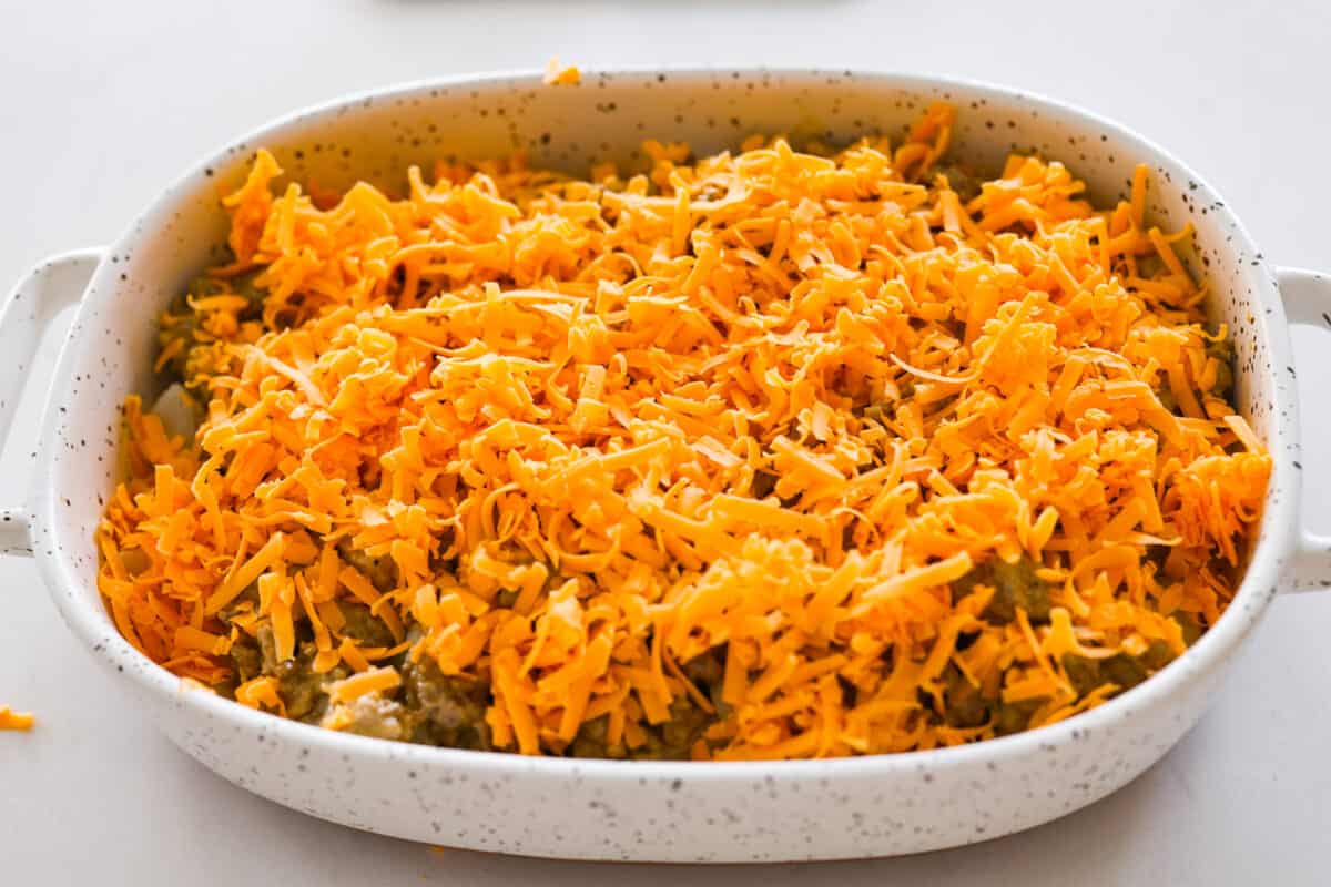 Meaty, cheesy, and chock full of tasty mix-ins like hash browns, pickles, and onions, Big Mac casserole is the perfect dinner to make this week! Itโs an easy, deconstructed version of the classic burger we all know and love. Sprinkling shredded cheese on the Big Mac casserole.