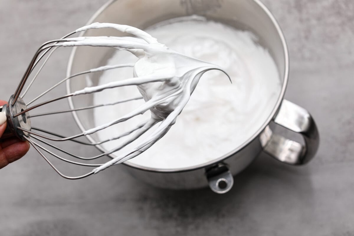 The most delicious Swiss Meringue Buttercream is easy to make with just 5 simple ingredients! It whips up deliciously light and silky with the right amount of sweetness. The perfect finishing touch for all of your favorite treats! Achieving stiff peaks