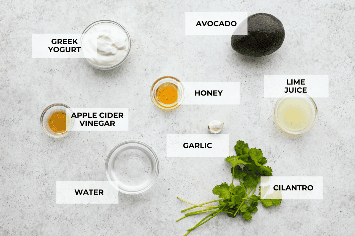 This dressing is packed with flavor and so creamy! It's delicious on salads, burrito bowls, tacos, and even burgers and wraps. I love how quick and easy it is to make with simple ingredients, and it has the perfect balance of tangy, nutty and subtly sweet flavors. Overhead view of ingredients for in small bowls, labeled.