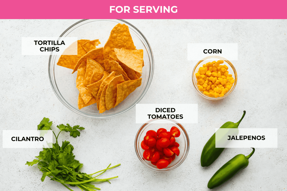 Get ready to rustle up some serious flavor with this Cowboy Queso! Packed with zesty sausage, hearty beans, and a kick of beer, it's the perfect dip for any gathering—just grab your tortilla chips and dig in! Top view of the individual garnish ingredients, each labeled.