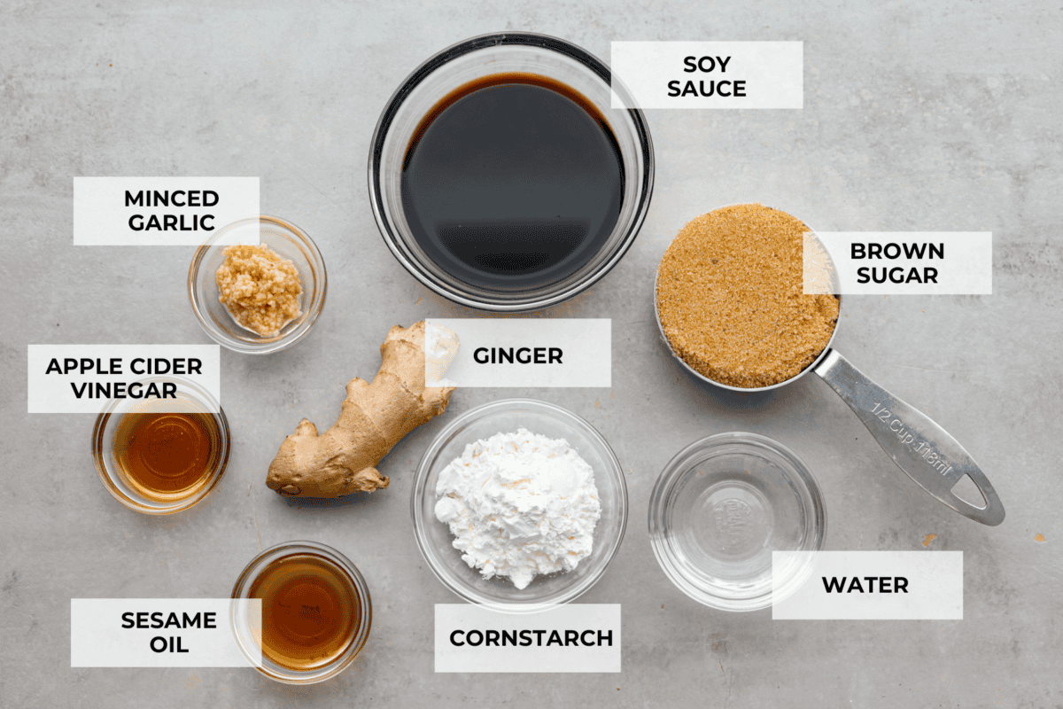 Teriyaki Sauce is super easy, takes only 10 minutes to make and is way better than store-bought! Made with simple ingredients, this is going to become a staple for your kitchen. Ingredients laid out individually on the counter and labeled.