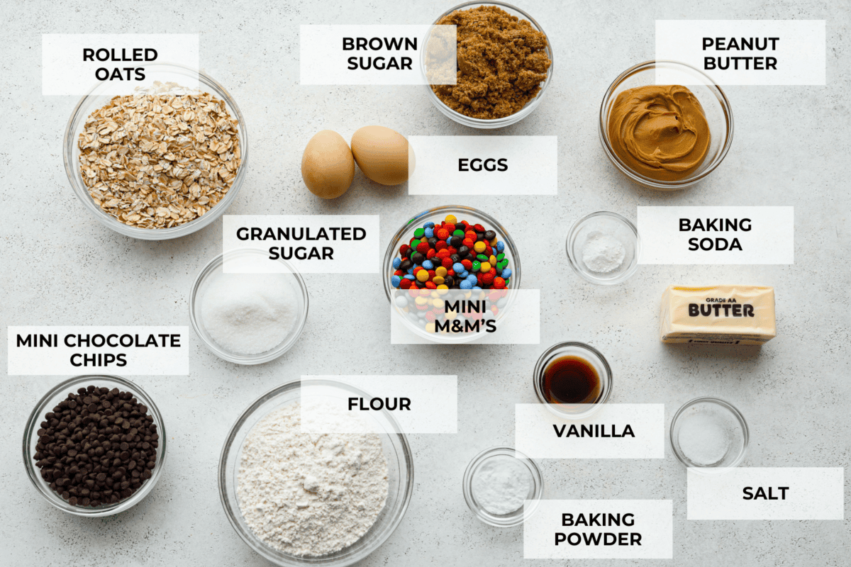 Monster cookies are slightly crisp on the outside, and soft and chewy in the center. They are loaded with peanut butter, oats, M&M candies, AND chocolate chips! Big monster cookies win every time! Ingredients labeled to make monster cookies.