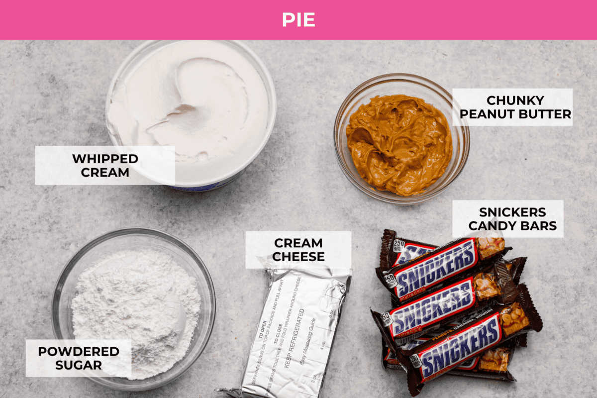 No Bake Snickers Bar Pie is one of the easiest and most delicious no bake pies that you make. You will love the Snickers pieces in every bite! A top view of the ingredients for the pie filling, all individually labeled.