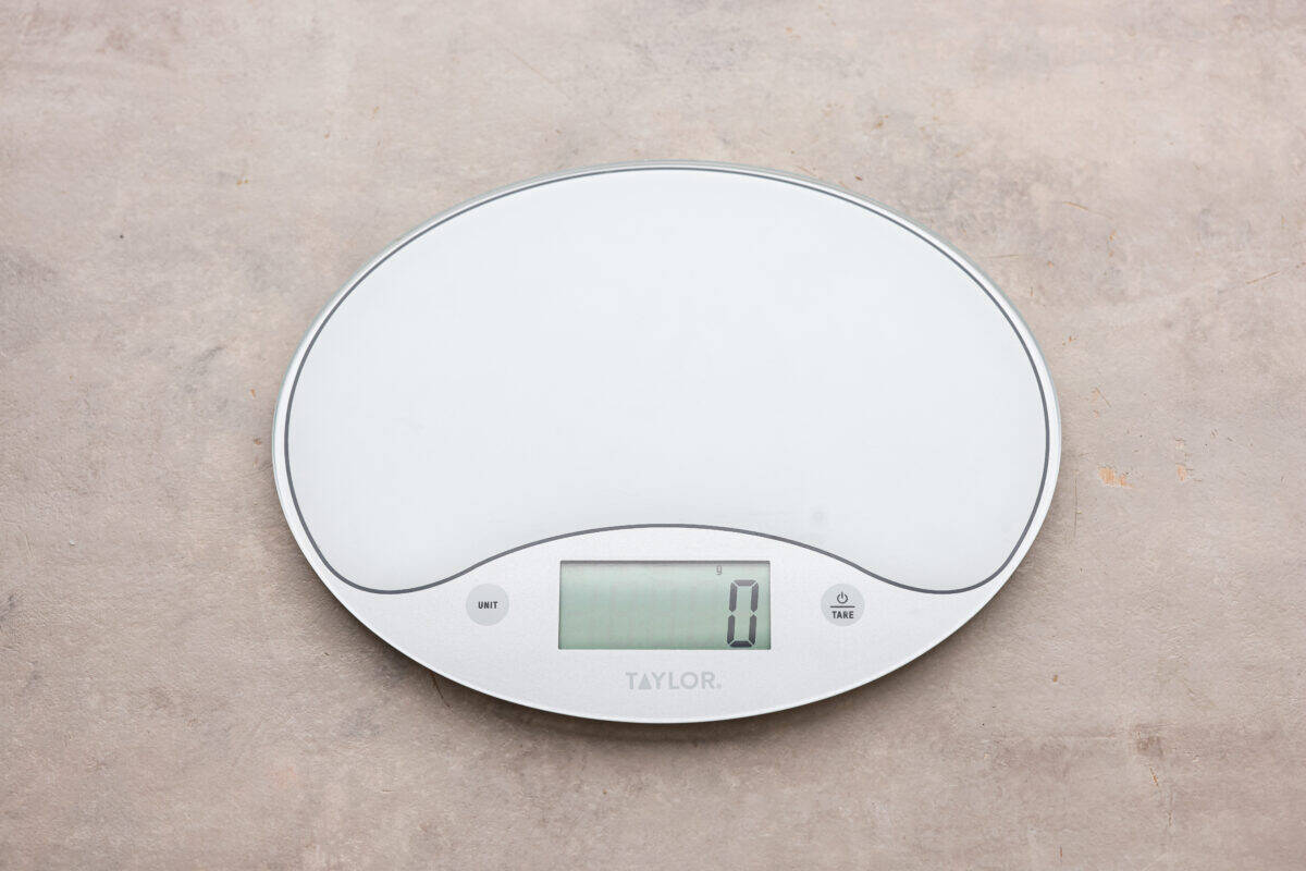 Whether you are a seasoned baker or just starting out, this informational post has all of my tips and tricks on how to properly measure baking ingredients. A food scale set to zero.