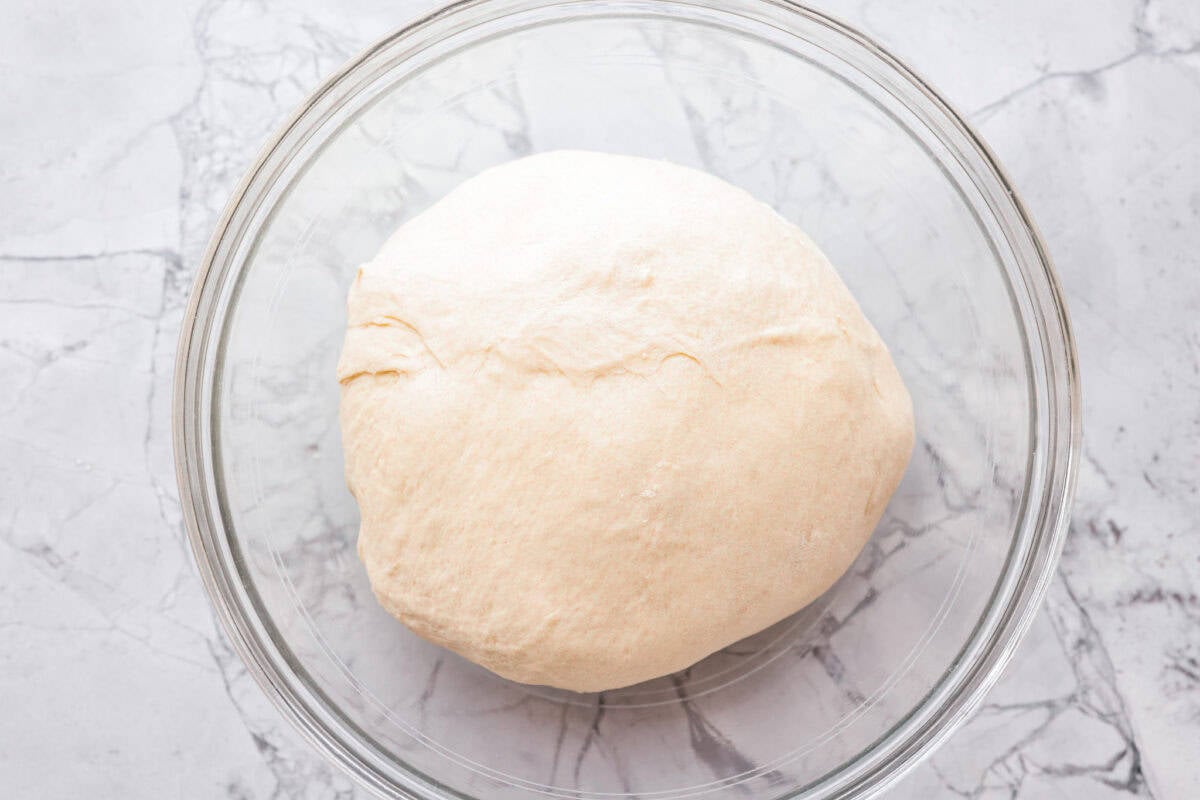 You asked for help with yeast, so I have created a "How to Bake with Yeast" guide just for you! Yeast doesn't have to be intimidating, and I hope that by the end of this post, you will be an expert! Dough in a bowl before it is proofed.