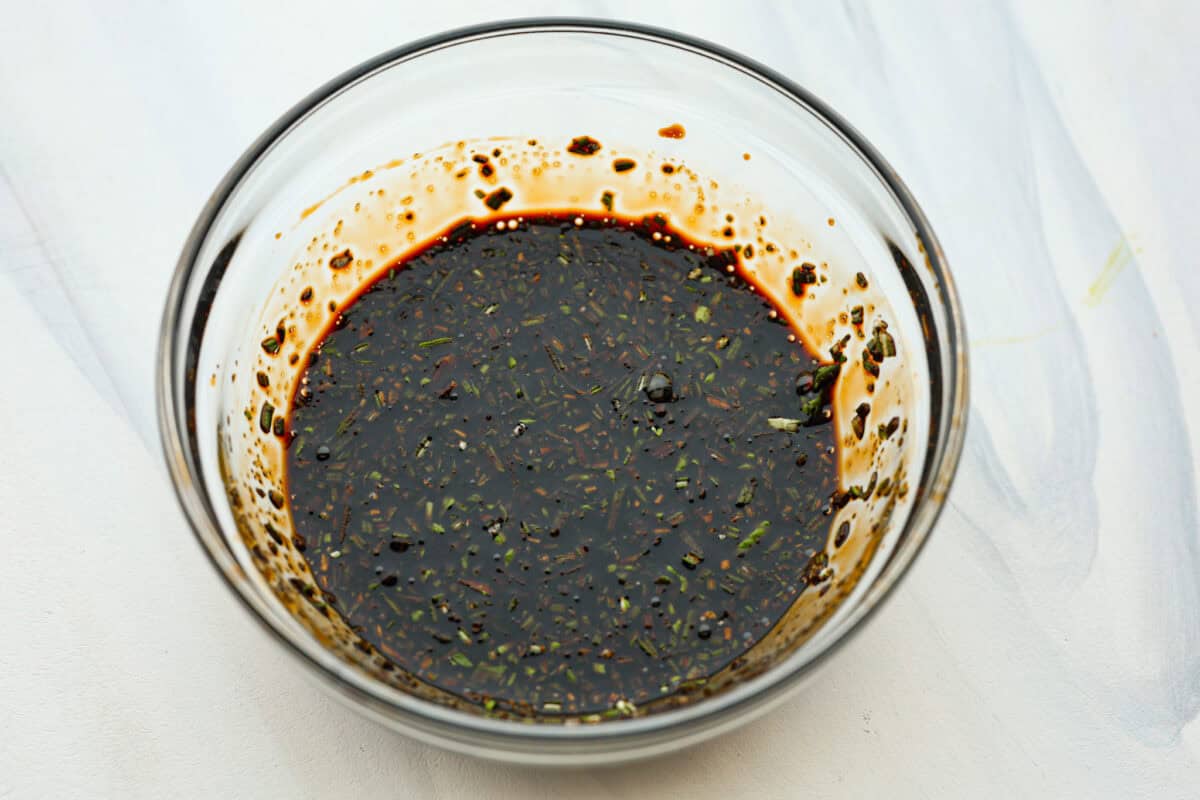 The depth of flavors in these garlic balsamic mushrooms is next level! Sauteed mushrooms are coated in a sweet balsamic sauce loaded with herbs. It's a simple and impressive side dish that only takes minutes to prepare. Third photo of the sauce ingredients whisked together.