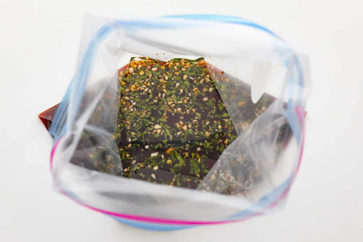 A good salmon marinade is the best way to achieve a seafood meal that's incredibly flavorful with tender, juicy fish! The top view of a ziplock bag of marinade.