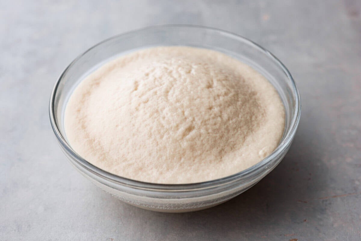You asked for help with yeast, so I have created a "How to Bake with Yeast" guide just for you! Yeast doesn't have to be intimidating, and I hope that by the end of this post, you will be an expert! Yeast in a bowl that is not expired and results in a frothy mixture.