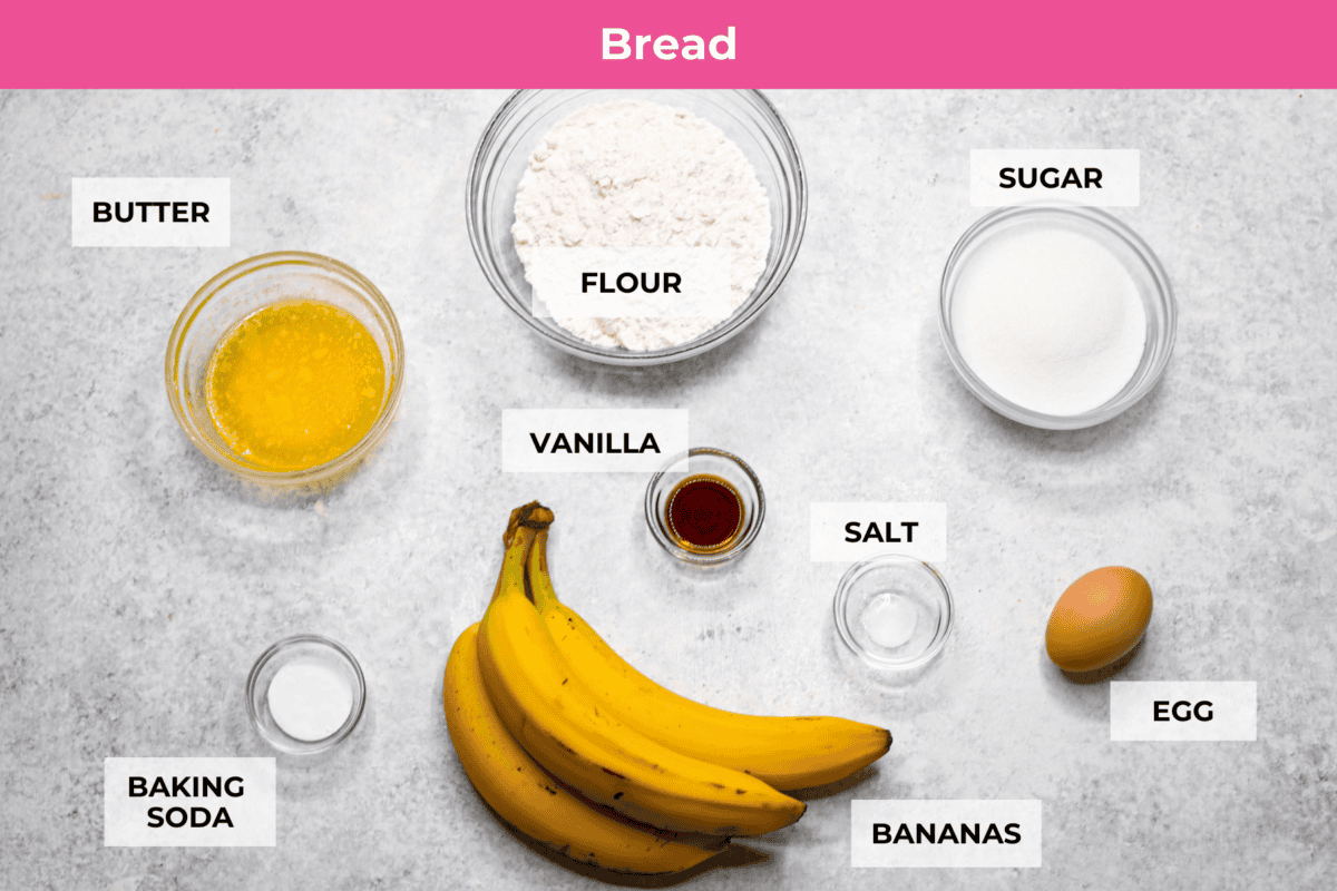 Cinnamon Swirl Banana Bread is a delightful twist on the classic. What sets this recipe apart is the luscious cinnamon sugar swirl running through the middle and on top, creating a beautiful marbled effect and an extra burst of flavor. It's irresistibly delicious! Overhead shot of labeled ingredients for banana bread.