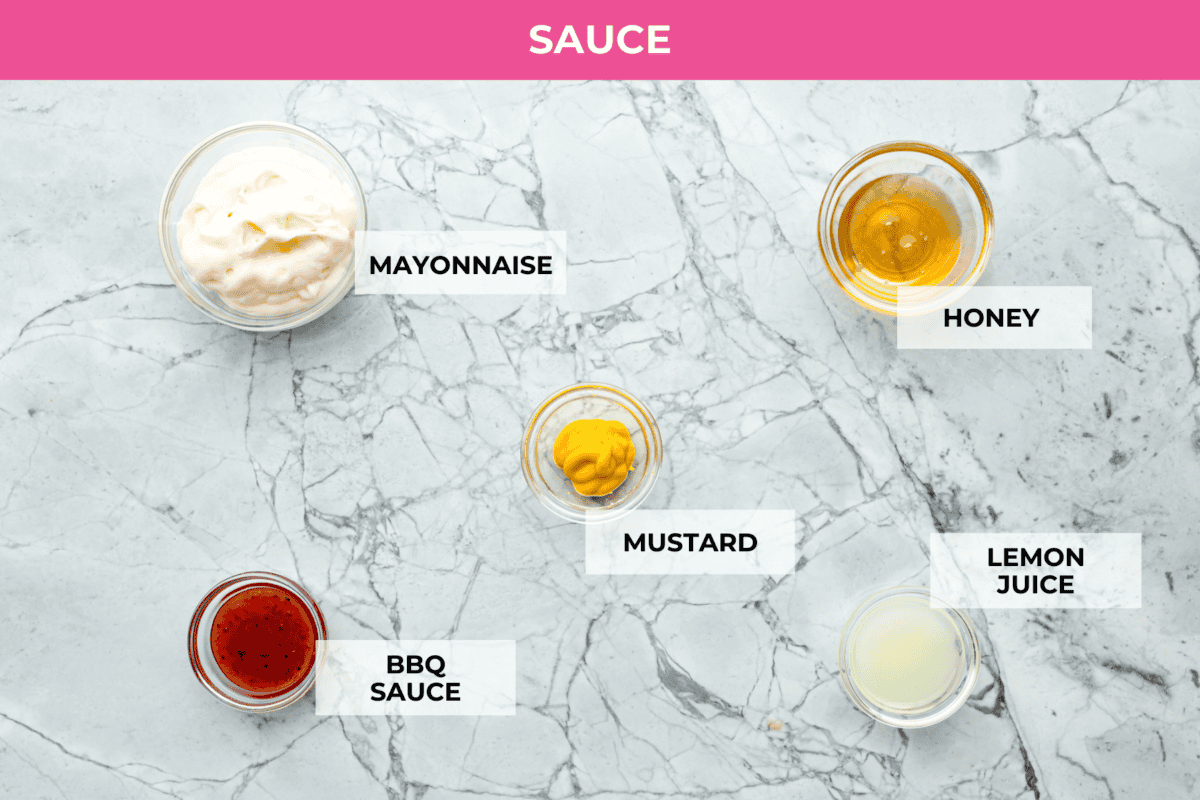 These Chick-fil-A Nuggets taste just like the real thing! They are crispy and salty with the slightest hint of sweetness.ย Pair them with the Chick-fil-A sauce and make the perfect family meal! Top view shot of the ingredients for the chick oil a sauce.