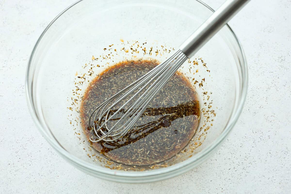 This air fryer shrimp is tender, delicious, and so easy to make! With only a few ingredients, the marinated shrimp cooks to perfection and has the best flavor! Third photo of the marinade mixed.