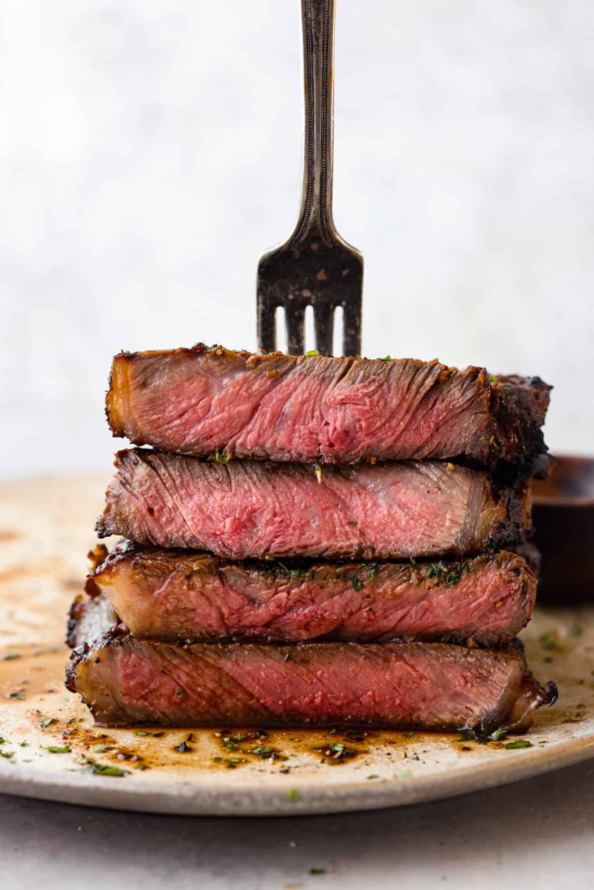 Fire up your grill because these grilling basics will give you all the confidence you need! Discover how easy it is to cook, entertain, and make incredible food on an outdoor grill. Close view of cut steak sliced