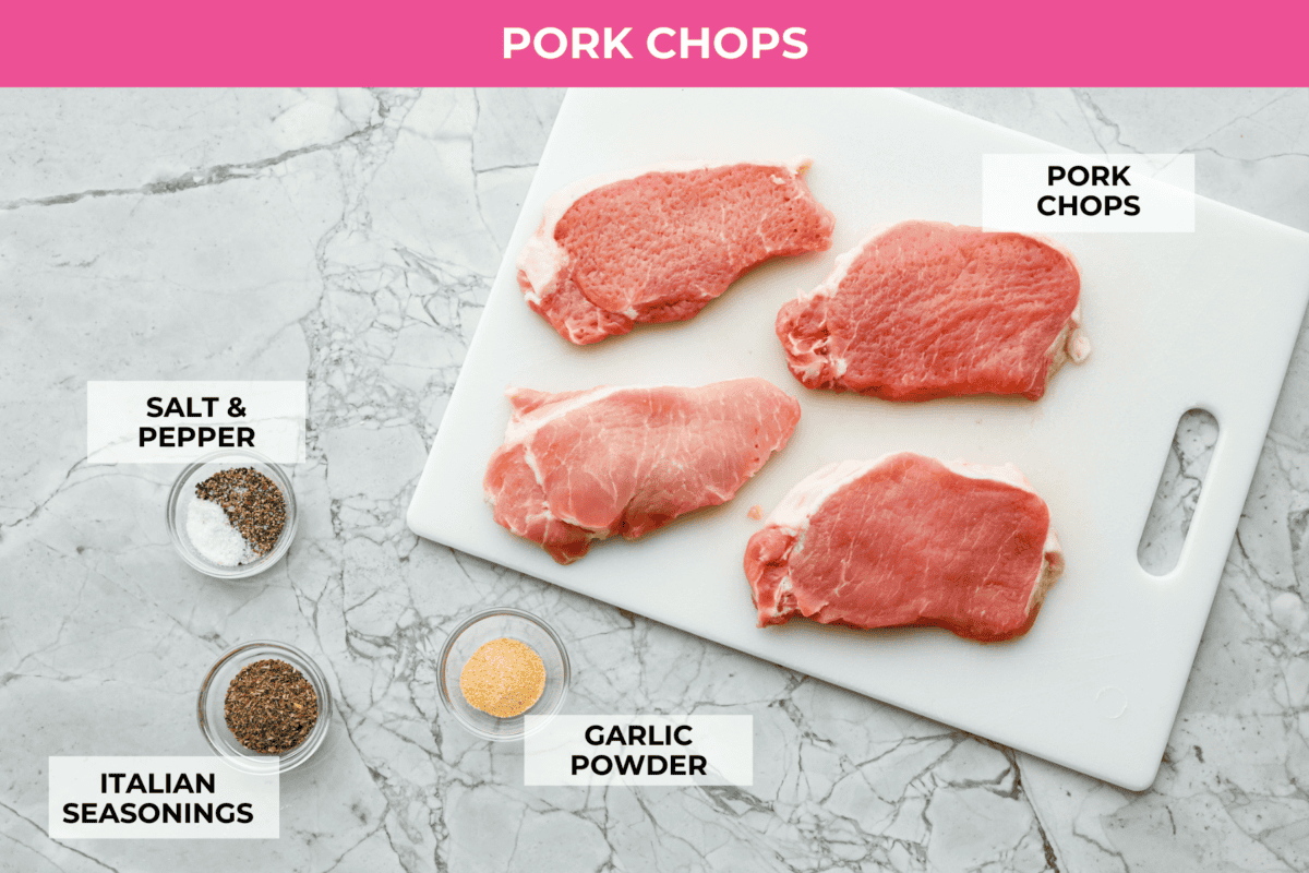 Boursin Pork Chops are savory, tender, and covered in a delicious cheesy cream sauce. This one-pan recipe is the perfect easy main that can be on your dinner table in just 30 minutes! Overhead shot of labeled ingredients.