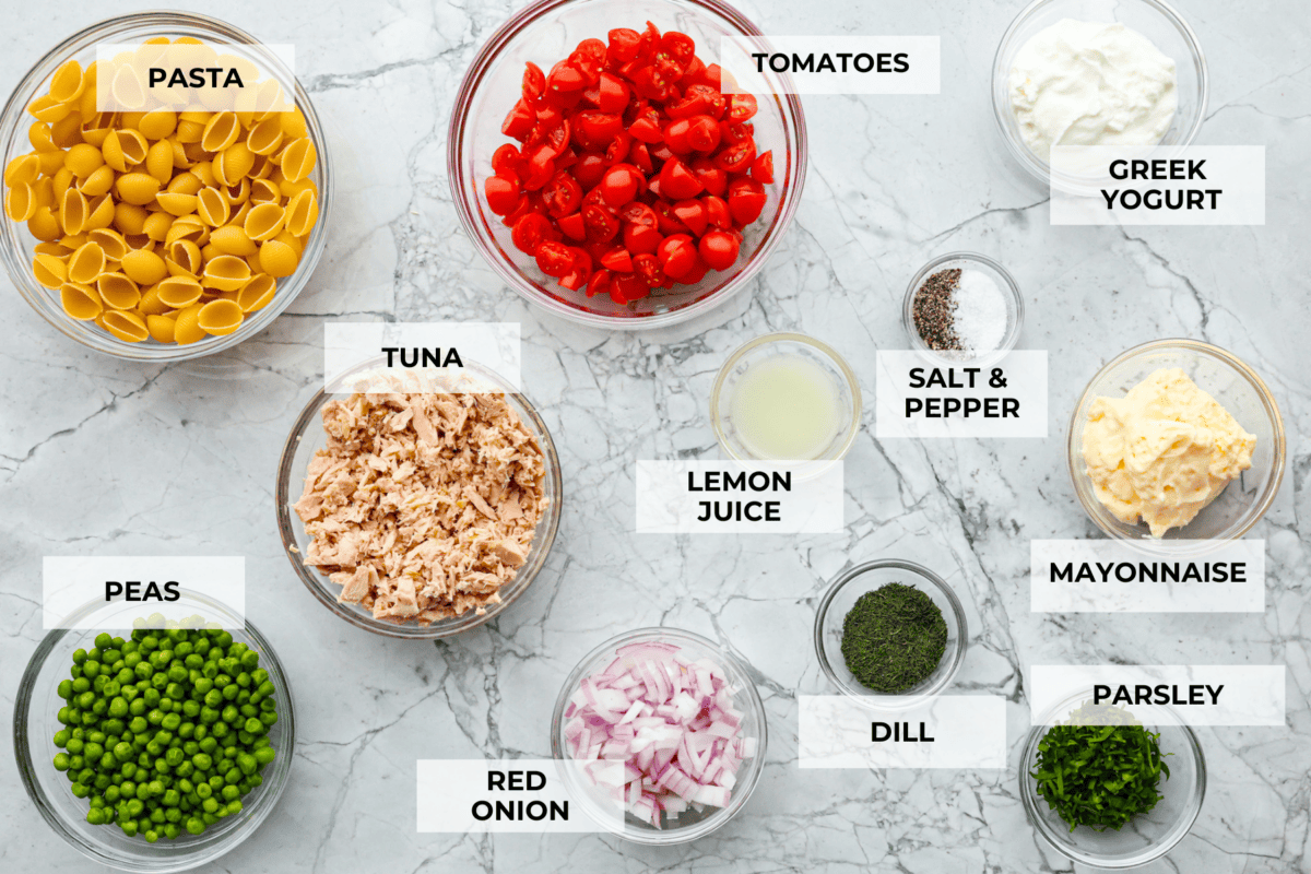 Tuna pasta salad is a perfect protein-packed lunch or side dish! It combines tuna, veggies, and pasta then gets tossed in a creamy dill dressing. Ingredients listed to make tuna pasta salad.