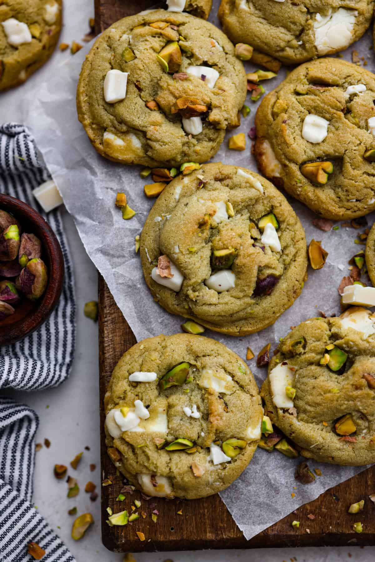 Pistachio Pudding Cookies are super soft, chewy, and irresistible! They're easy to make, and adding pistachio pudding mix gives this cookie recipe wonderful flavor and the perfect tender texture! Overhead shot of baked pistachio pudding cookies.