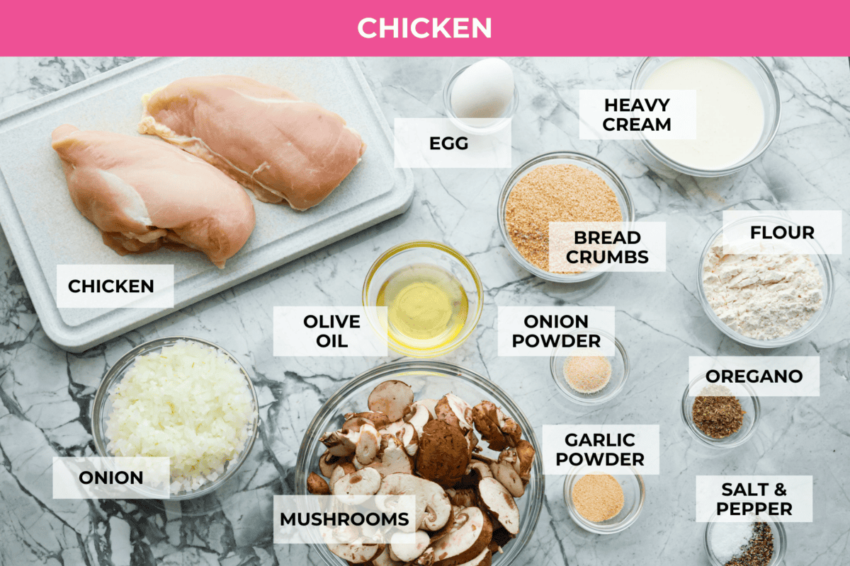 Smothered chicken is a flavorful comfort food full of rich, creamy gravy, tender chicken cutlets, and savory mushrooms. Perfect on its own or paired with mashed potatoes, rice or pasta, you're family will definitely want this on the weekly meal plan. Overhead shot of labeled chicken ingredients.
