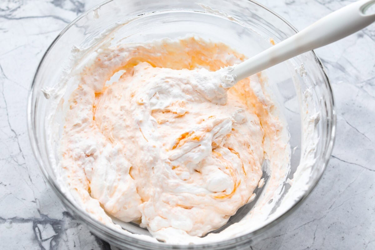 t's peach season which means you have to make this Peach Fluff Salad! It's a creamy, fruity dessert that hits all the right notes and is packed with fresh peaches! Whipped cream added to the mixture.