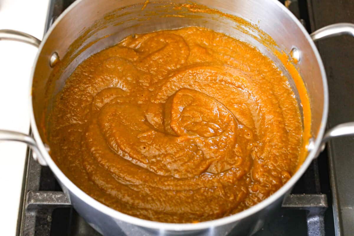 Thisย Harry Potterย Pumpkin Juice will transport you to a magical ride on the Hogwarts Express or eating lunch with your friends in the great hall. Bursting with warm, cozy fall flavor, you will love feeling part of the wizarding world of Harry Potter with this magical drink. Overhead shot of puree spices and water mixture mixed together in the pan.