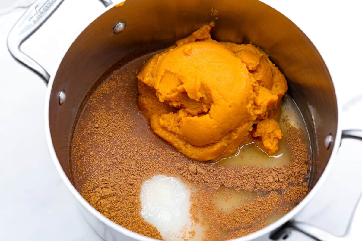 Thisย Harry Potterย Pumpkin Juice will transport you to a magical ride on the Hogwarts Express or eating lunch with your friends in the great hall. Bursting with warm, cozy fall flavor, you will love feeling part of the wizarding world of Harry Potter with this magical drink. Overhead shot of pumpkin puree, water, sugar and spices in a sauce pan.