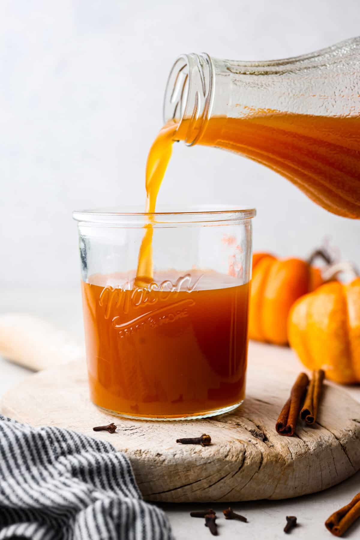 Thisย Harry Potterย Pumpkin Juice will transport you to a magical ride on the Hogwarts Express or eating lunch with your friends in the great hall. Bursting with warm, cozy fall flavor, you will love feeling part of the wizarding world of Harry Potter with this magical drink. Side shot of Harry Potter pumpkin juice being poured into a glass.