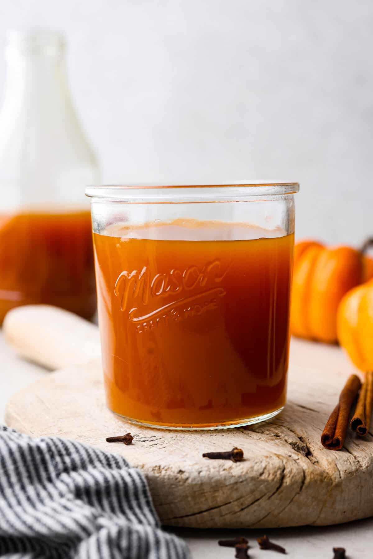 Thisย Harry Potterย Pumpkin Juice will transport you to a magical ride on the Hogwarts Express or eating lunch with your friends in the great hall. Bursting with warm, cozy fall flavor, you will love feeling part of the wizarding world of Harry Potter with this magical drink. Close up shot of pumpkin juice in a glass cup.