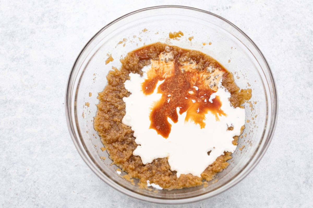 Delicious and addicting, the famous Crack Pie is what made Milk Bar bakery so popular. This copycat recipe is made with a sweet and salty filling tucked inside a crispy oat cookie crust. It’s so good you won’t be able to stop eating it! Overhead shot of the sugar and butter mixture with cream and vanilla.