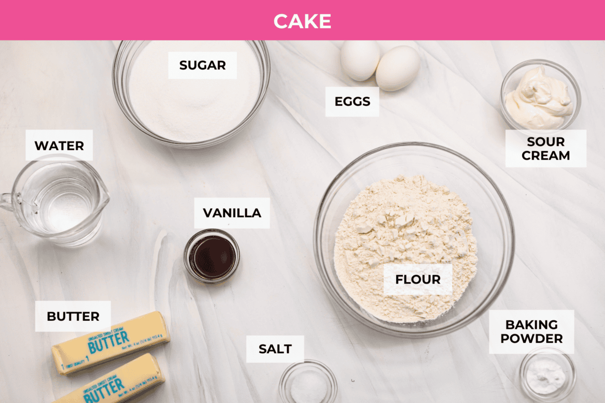 Browned Butter Sheet Cake is the perfect blend of moist, sweet, and irresistibly nutty. With the rich, caramel-like flavor of browned butter baked into every bite, this cake is a treat for anyone who loves a touch of warmth in their desserts. Overhead shot of labeled cake ingredients.