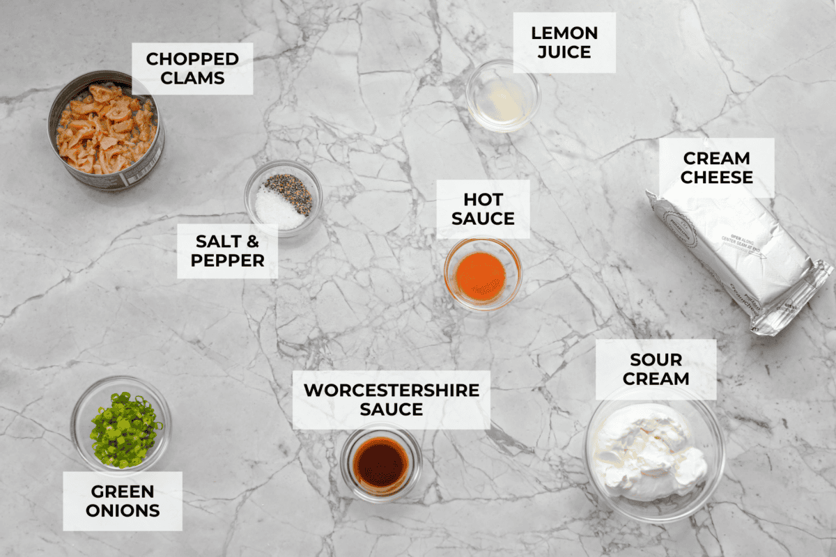 This clam dip is creamy, savory and the ultimate crowd-pleaser for any gathering! Whether paired with crispy chips or fresh veggies, it’s a quick and easy recipe that tastes incredible. Perfect for game day, potlucks, holidays or a casual snack! Overhead shot of labeled ingredients.