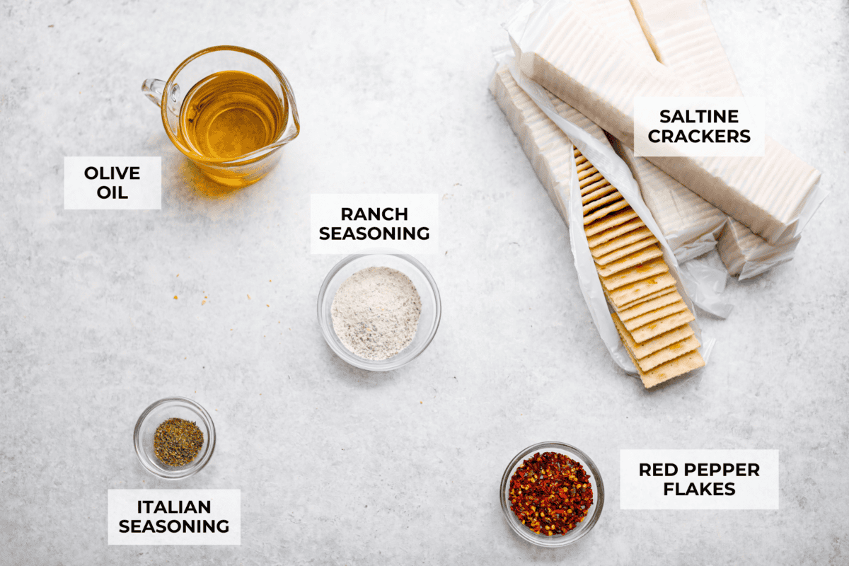 Get the party started with Fire Crackers! In this recipe, saltine crackers are transformed from something ordinary into something extraordinary with a flavorful blend of seasonings. They're easy to make and perfect for snacking on around the holidays (or anytime)! Overhead shot of labeled ingredients.