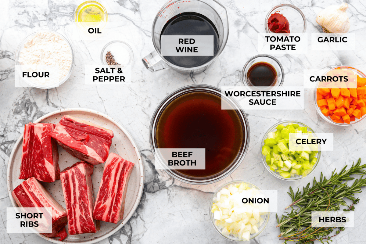 Tender braised short ribs will fall off the bone and leave you speechless! Seared then cooked in a red wine reduction, beef broth, and fresh herbs. Every bite is tender perfection and will melt in your mouth! Ingredients labeled to make braised short ribs.