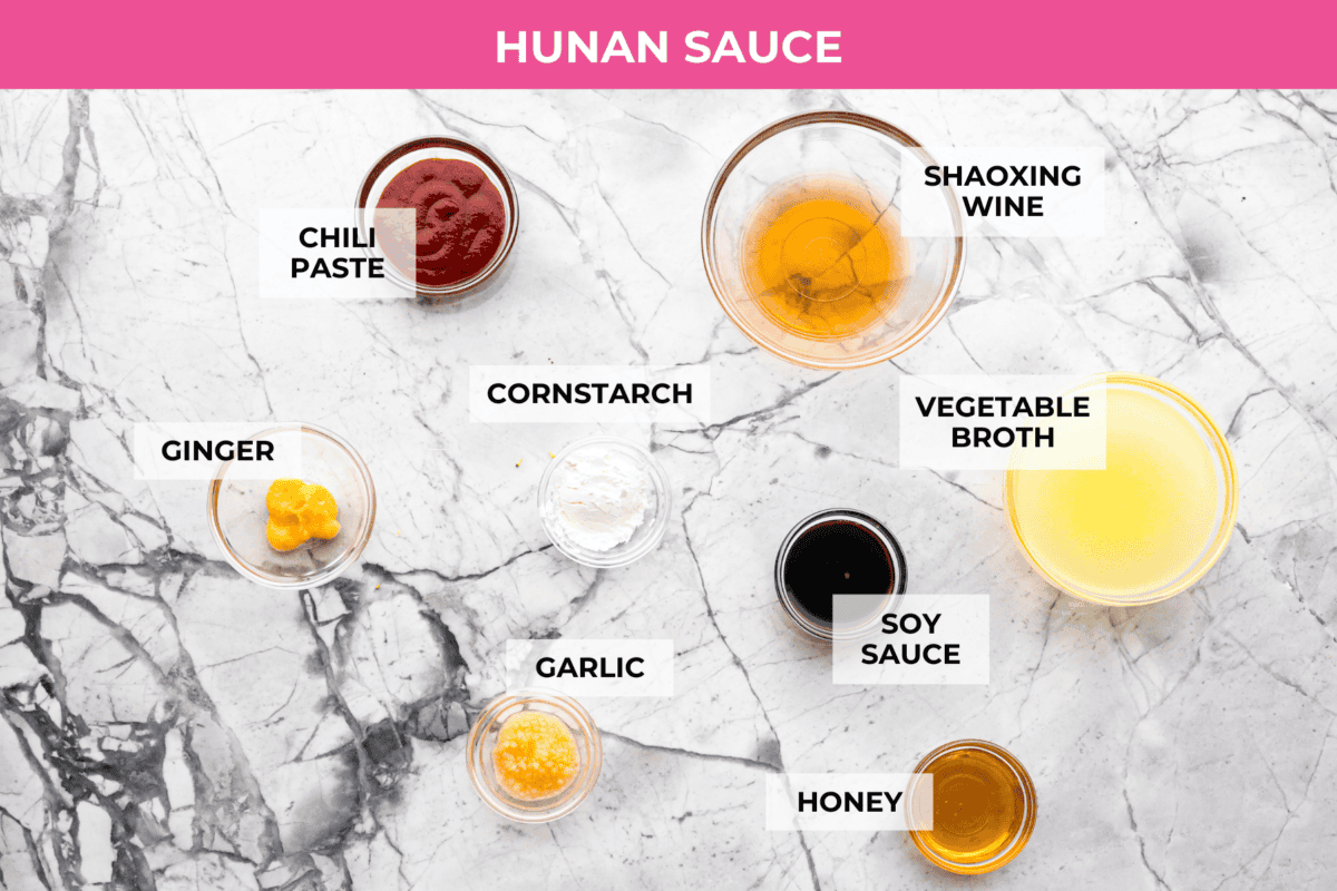 Hunan chicken is a tasty take-out favorite that can be made right at home! Tender chicken and veggies are tossed in the signature hunan sauce. It's savory with a hint of sweet and spicy! This easy one-pan dinner is ready in 30 minutes! Ingredients labeled to make the Hunan sauce.