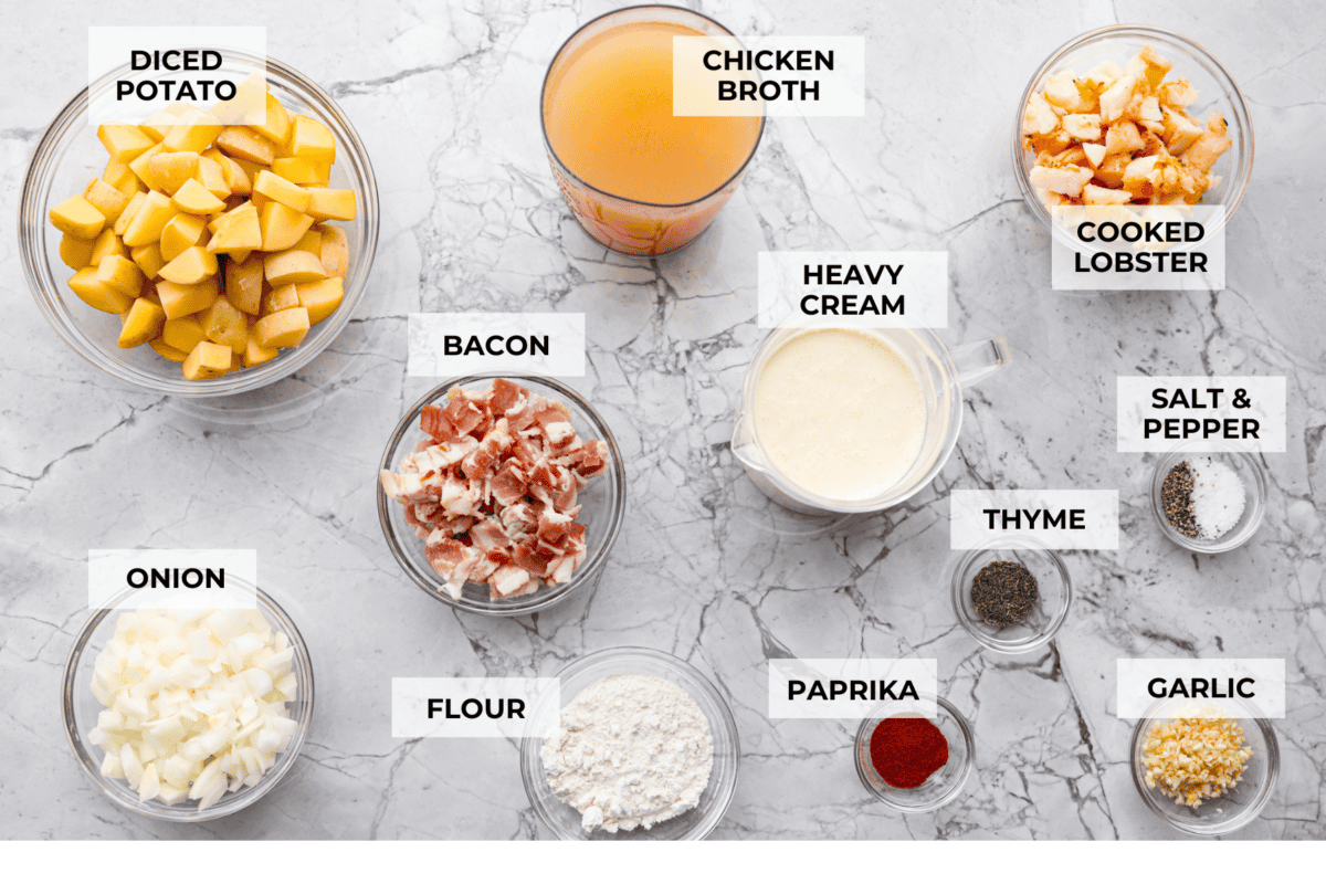 Creamy, indulgent Lobster Chowder takes only 40 minutes to make and is incredibly flavorful! Tender potatoes, crisp bacon, and luscious lobster are enveloped in a creamy, velvety broth. It would be a great soup to serve on Valentine's Day or a special occasion, but easy enough for any night of the week. Overhead shot of labeled ingredients.