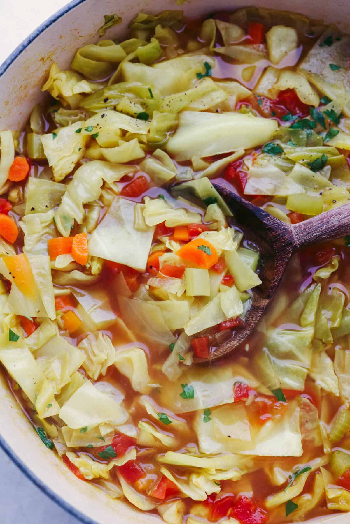 This Detox Cabbage Soup is the perfect way to kick off your New Year's resolutions! After indulging over the holidays, this soup will give you the kick-start you need to feel better. It's loaded with fresh veggies and essential vitamins and is super budget-friendly.