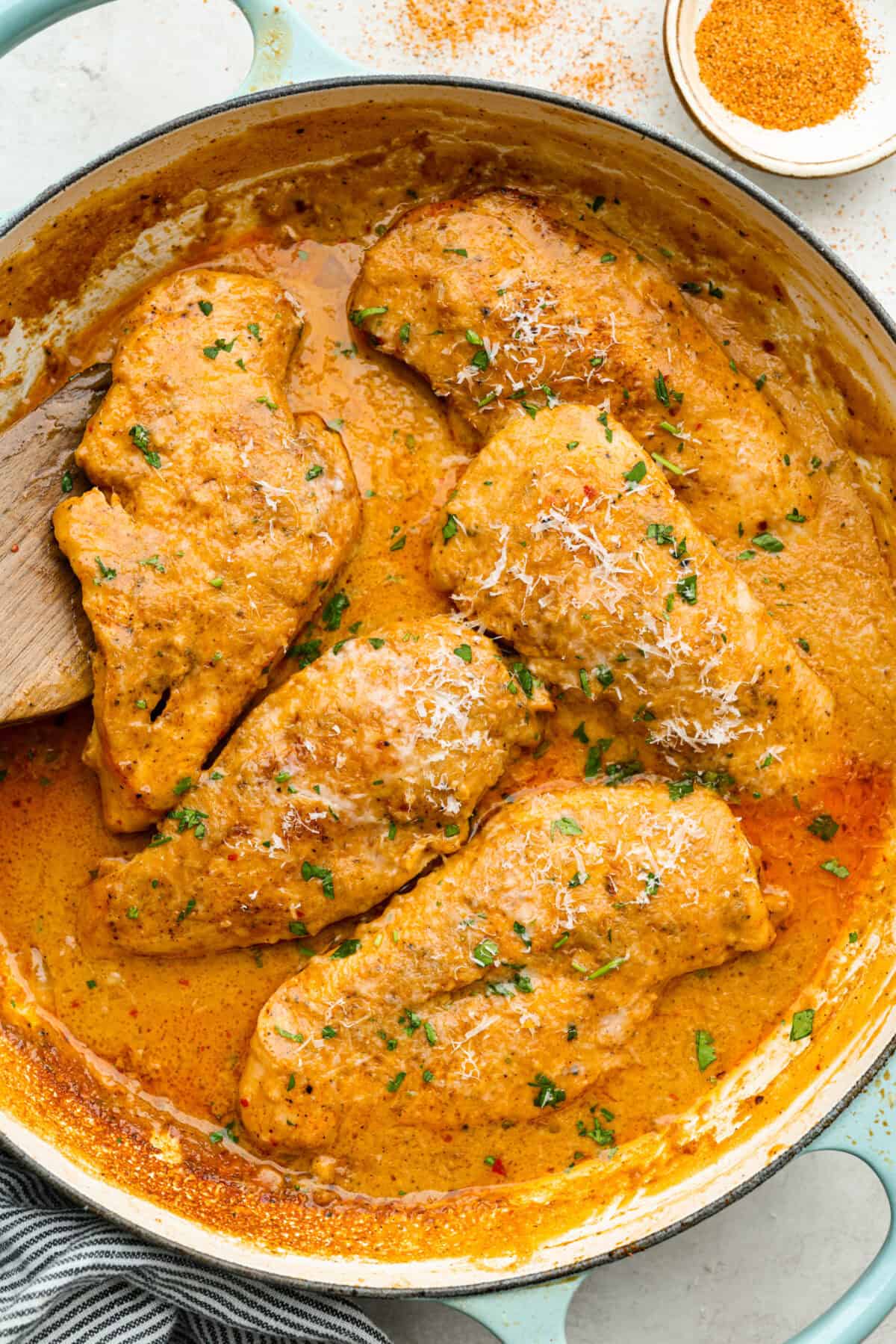Creamy Cajun Chicken is the perfect combination of bold, zesty flavors and rich, velvety sauce. Juicy, tender chicken is coated in a perfectly spiced Cajun seasoning and simmered in a luscious, creamy sauce thatโs packed with flavor. Overhead shot of creamy cajun chicken in a skillet.