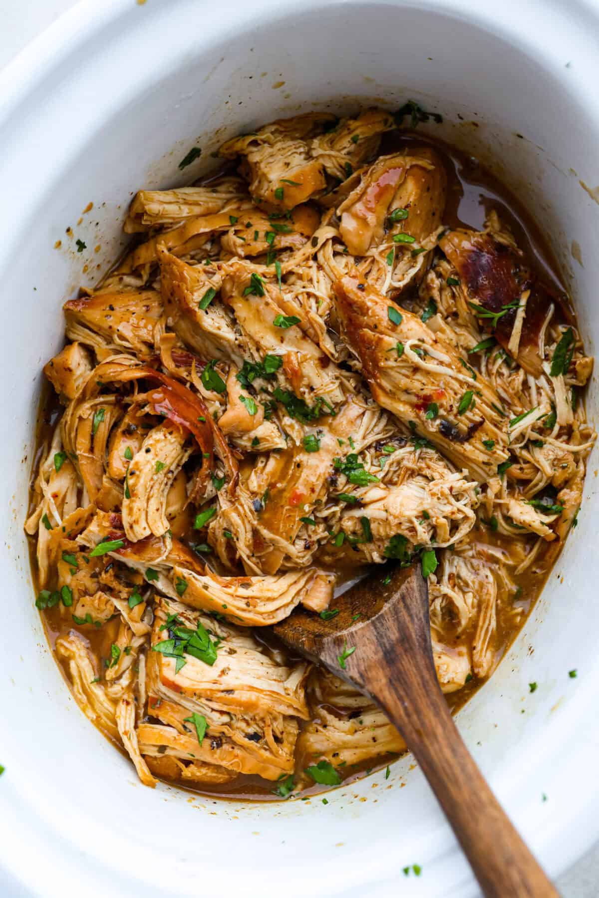 Overhead shot of 3 packet crockpot chicken. 