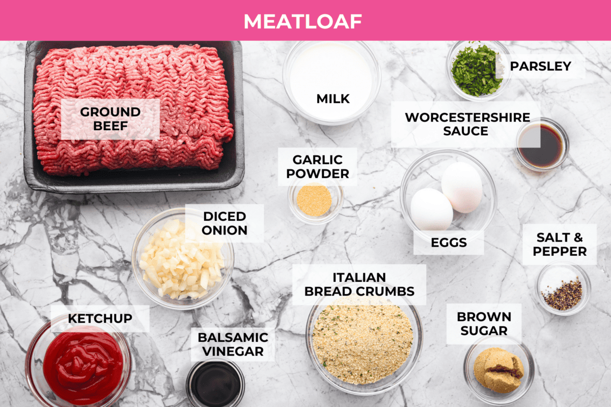 Turn classic meatloaf into amazing one-pan Meatloaf Casserole! Juicy, flavorful meatloaf and creamy mashed potatoes come together in one easy, delicious dish. Overhead shot of labeled meatloaf ingredients.