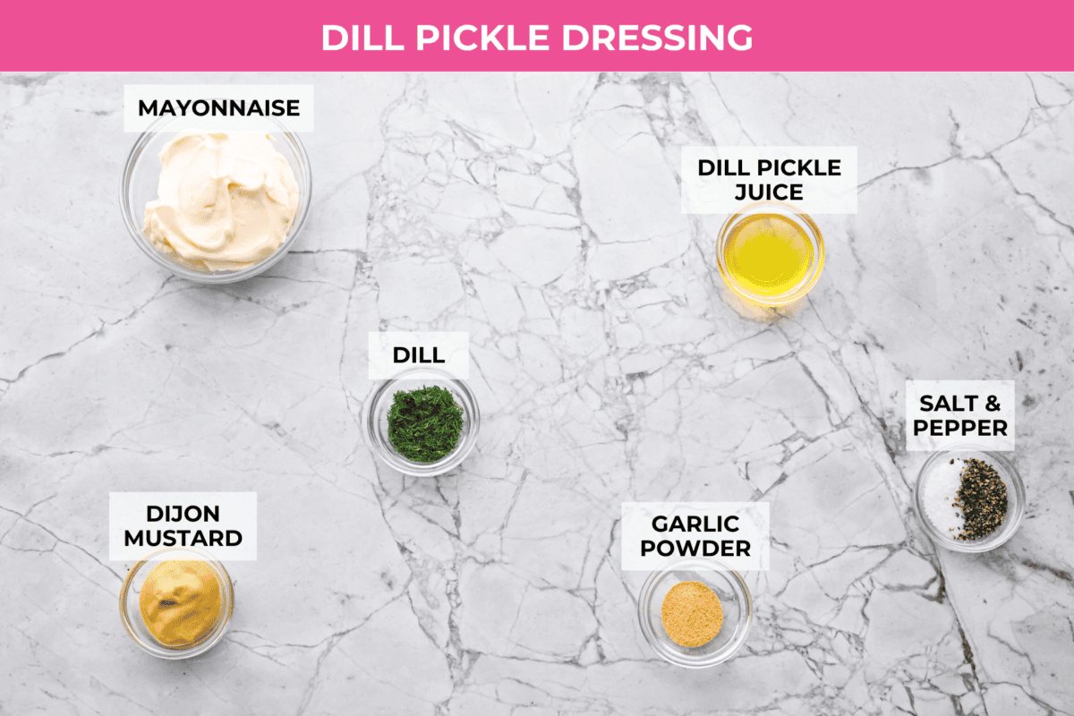 If you love that good pickle crunch, this high-protein Dill Pickle Chicken Salad is a must! It’s bold, zesty, and perfect for sandwiches or a snack right out of the bowl! Overhead shot of labeled dill pickle dressing ingredients.