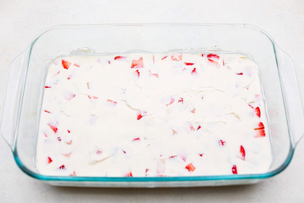 My Strawberry Delight is the ultimate summer showstopper! Buttery crust, juicy strawberries, sweet jello, and fluffy toppingโone bite and everyoneโs hooked. Cream cheese layer spread over strawberries and crust.