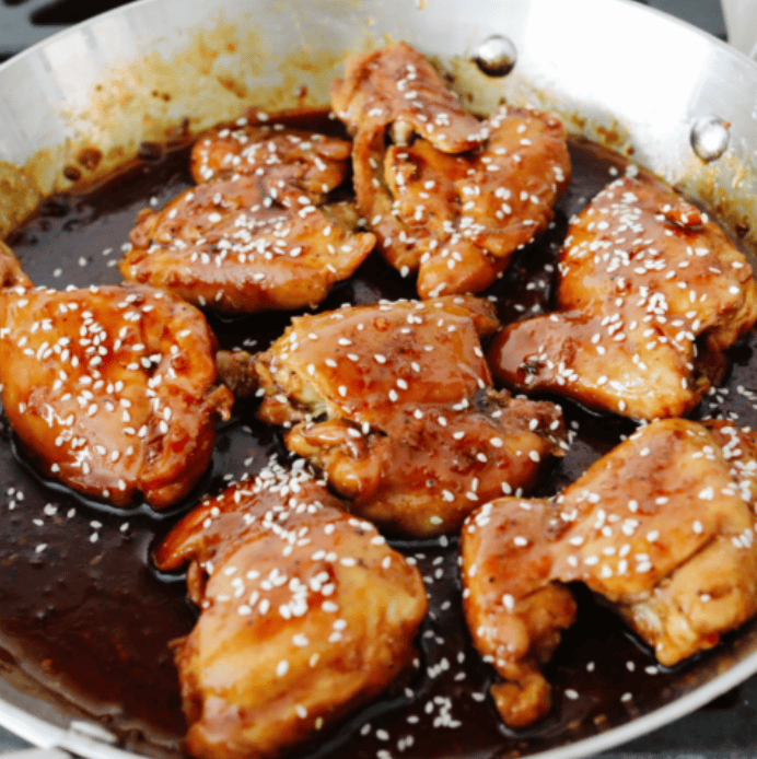 My Sticky Asian Glazed Chicken is one of those dinners I keep coming back to. Itโs sweet, a little savory, and full of flavorโbut honestly, itโs the caramelized glaze that seals the deal. It's SO GOOD! Chicken added back to the skillet and finished cooking in the sauce.