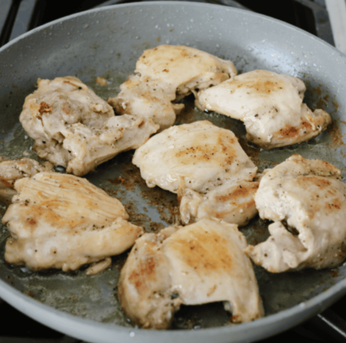 My Sticky Asian Glazed Chicken is one of those dinners I keep coming back to. Itโs sweet, a little savory, and full of flavorโbut honestly, itโs the caramelized glaze that seals the deal. It's SO GOOD! Chicken cooking in a skillet.