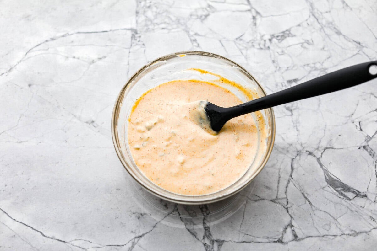 Confession—I’ve always been obsessed with McDonald’s Big Macs. My copycat Big Mac sauce tastes just like the real thing, maybe even better. I slather it on burgers and dip my fries in it. You have to try it! all of the ingredients mixed together in a bowl.
