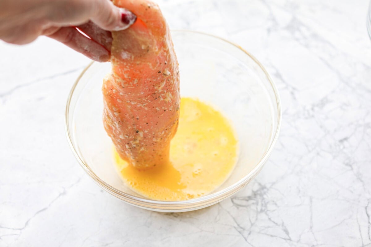 If youโve never had Chicken Francese, youโre in for a treat! Lightly breaded chicken, pan-fried to golden perfection, then bathed in a bright, buttery lemon sauce thatโs totally irresistible. Flour coated chicken breast being dipped in egg mixture.