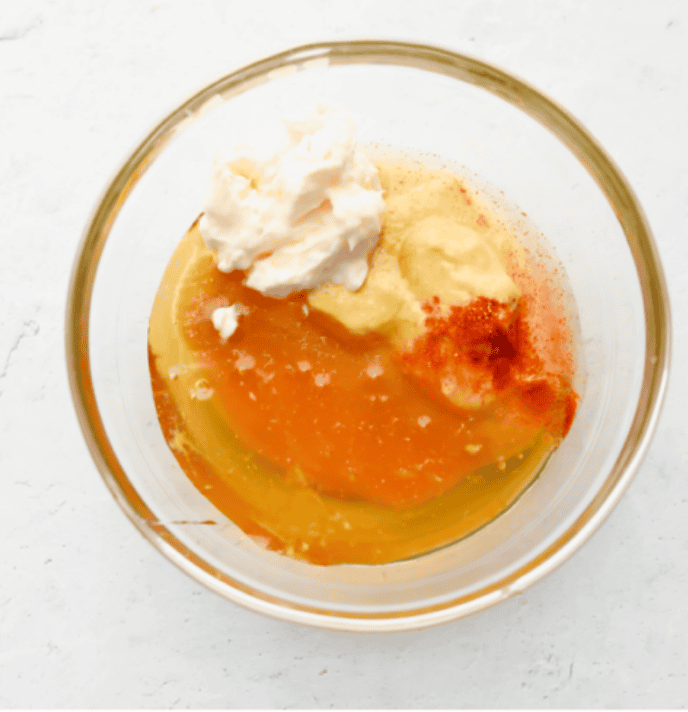 My all-time favorite sauce! This Honey Mustard is so addictive, youโll be drizzling it on everything! And the best part? It only takes 5 minutes with ingredients you probably already have in your kitchen. All of the ingredients in a bowl.
