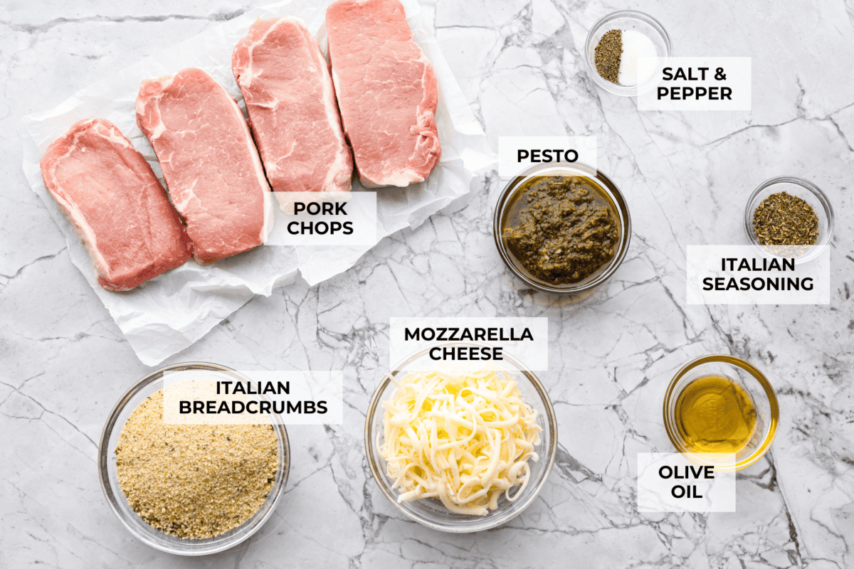 Stuffed pork chops sound fancy, but they’re super easy and budget-friendly. I’ll show you how to keep the pork chops moist and stuffed with gooey, cheesy deliciousness! Overhead shot of labeled ingredients.