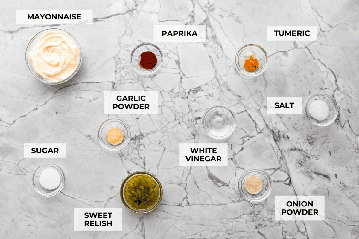 Confession—I’ve always been obsessed with McDonald’s Big Macs. My copycat Big Mac sauce tastes just like the real thing, maybe even better. I slather it on burgers and dip my fries in it. You have to try it! Overhead shot of labeled ingredients.
